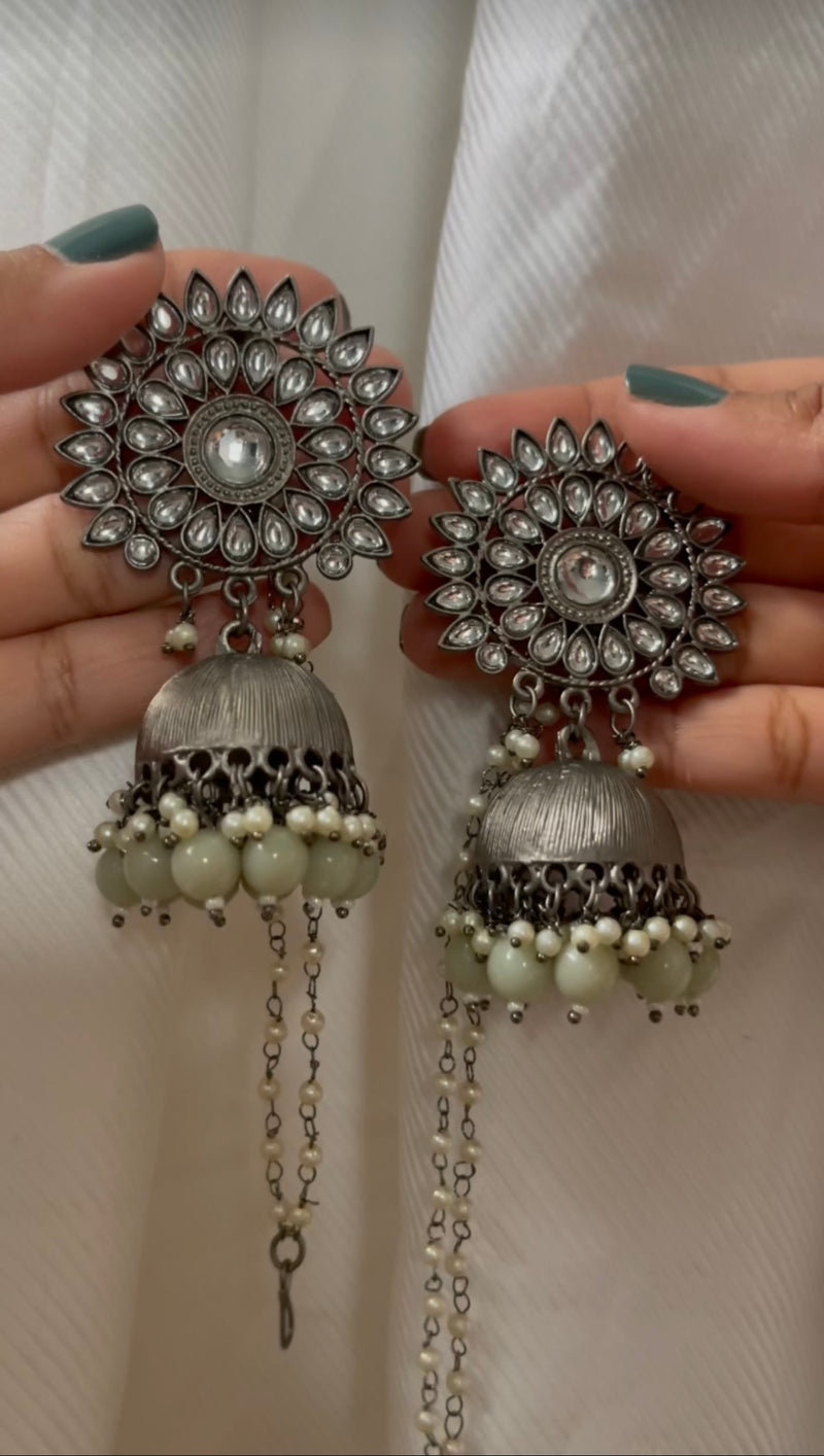 Hand-crafted black metal earrings with detachable pearl chain. Available in fun and vibrant colors. Perfect for a simple day-time look. Perfect bridesmaid jewelry and mehndi favors.