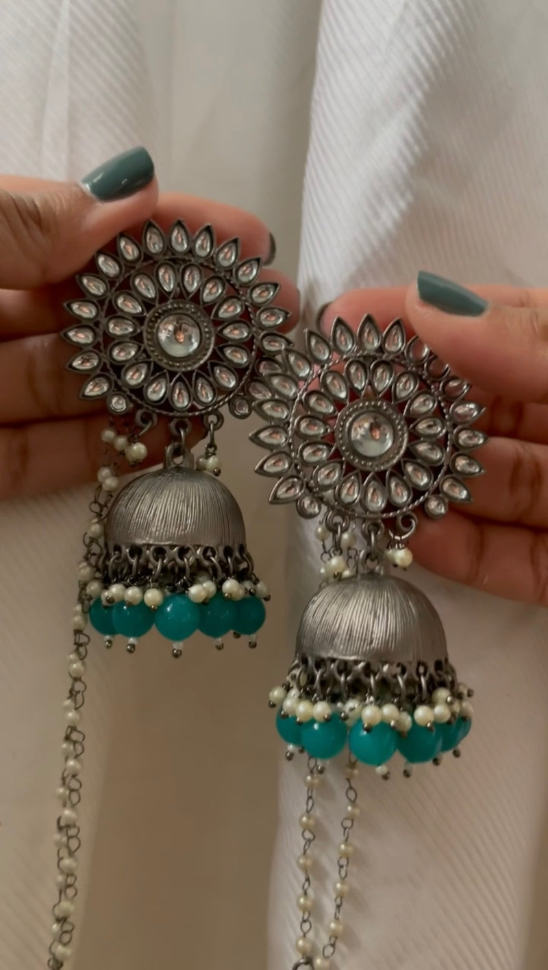 Hand-crafted black metal earrings with detachable pearl chain. Available in fun and vibrant colors. Perfect for a simple day-time look. Perfect bridesmaid jewelry and mehndi favors.